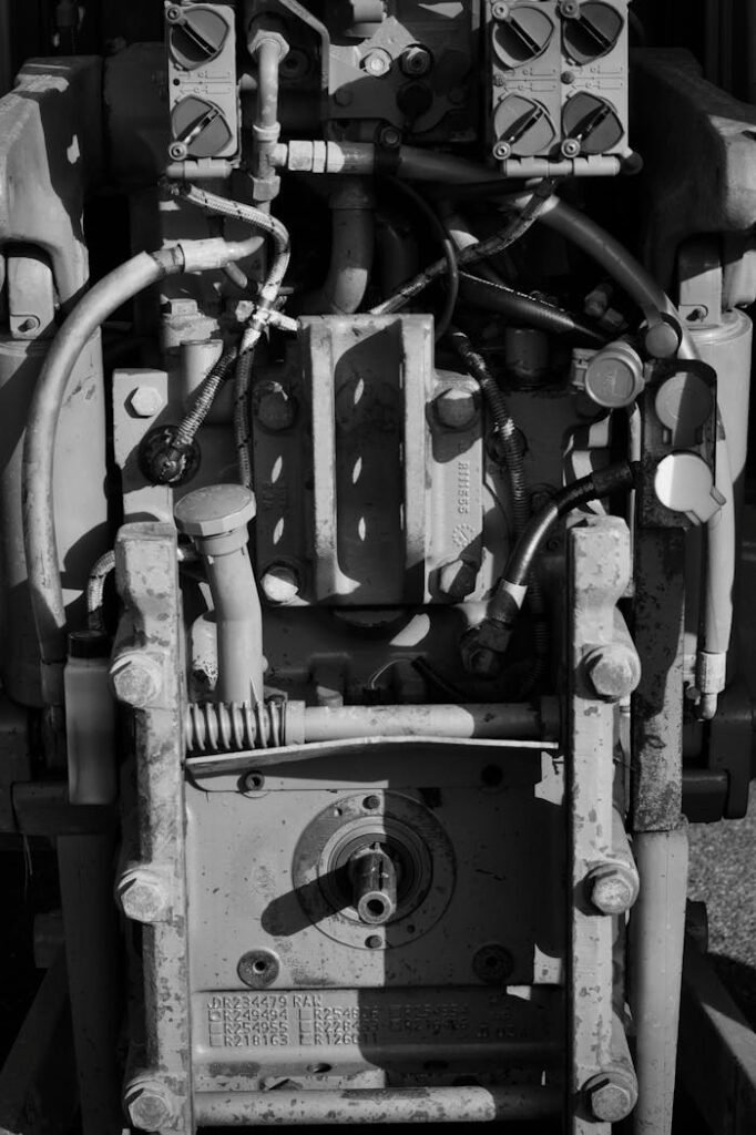 Detailed monochrome view of intricate industrial machinery components.
